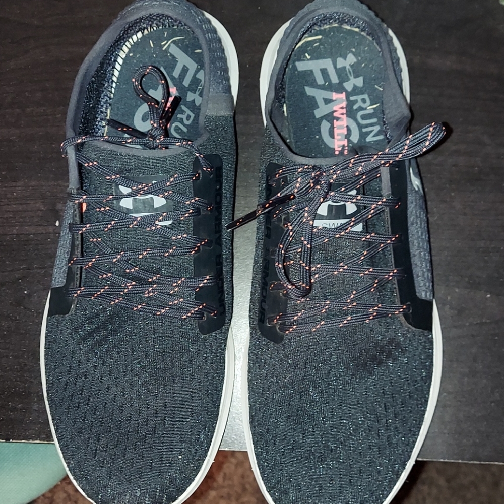 black amd pink under armor tennis shoes